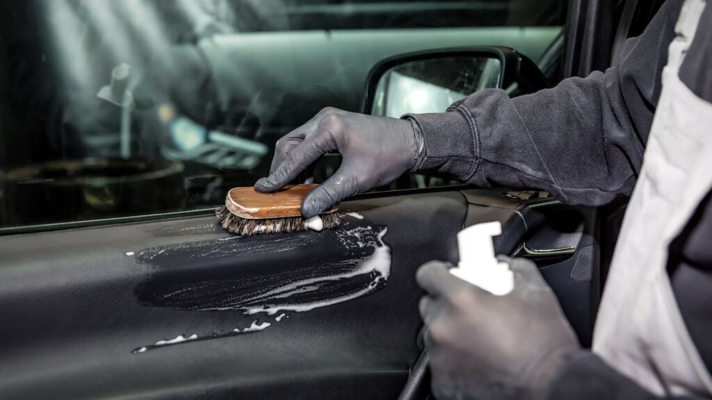 applying chemical on car interior